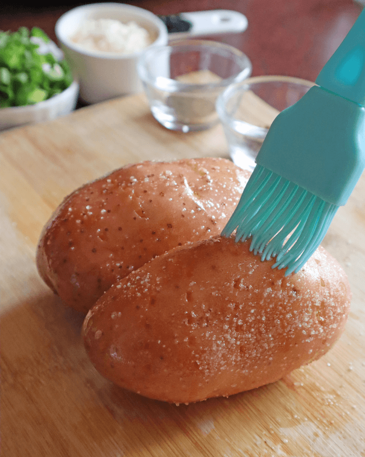 brush oil over potatoes