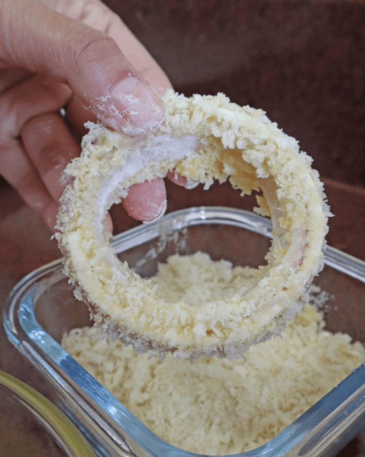 roll onion in flour