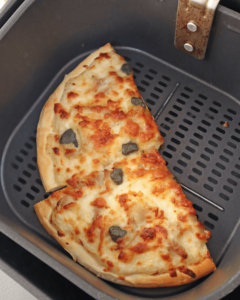 heating frozen pizza in an air fryer