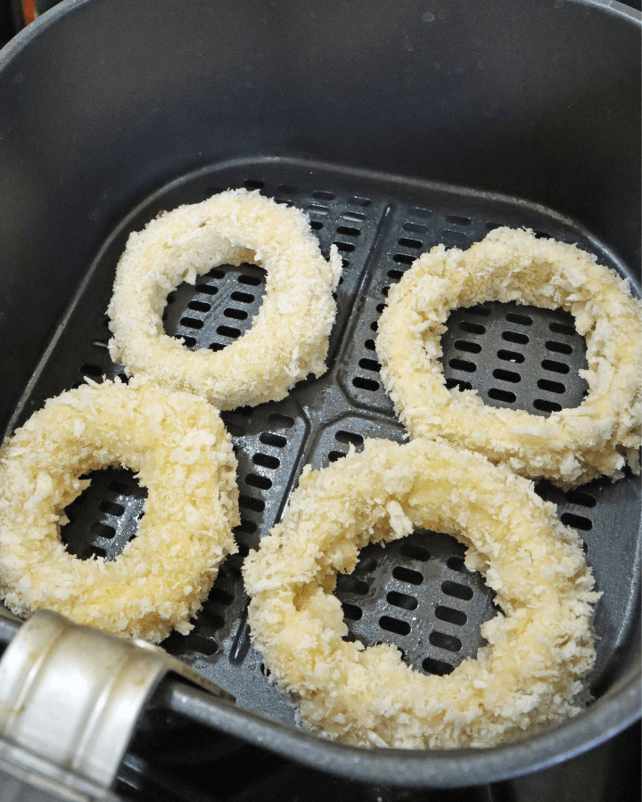 transfer coated onion rings into basket