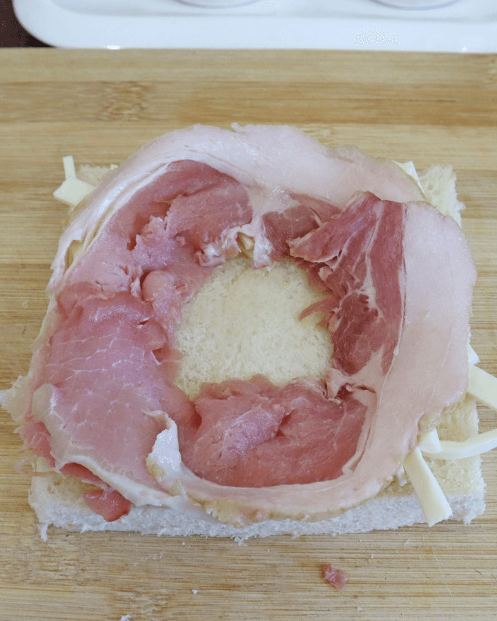 add bacon around edges of bread