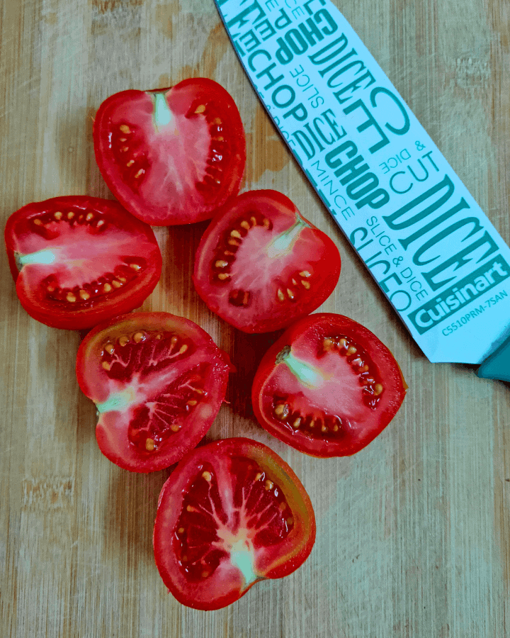 cut tomatoes into half 