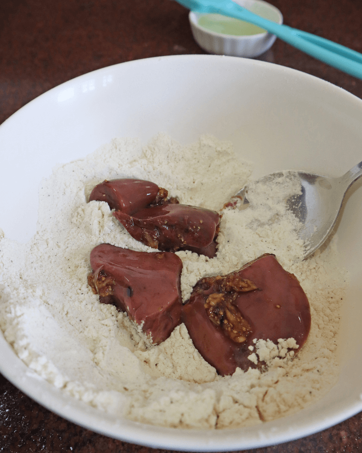 coat marinated chicken livers in flour