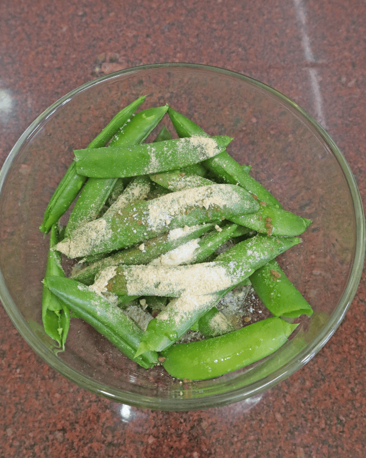 add seasoning to snap peas