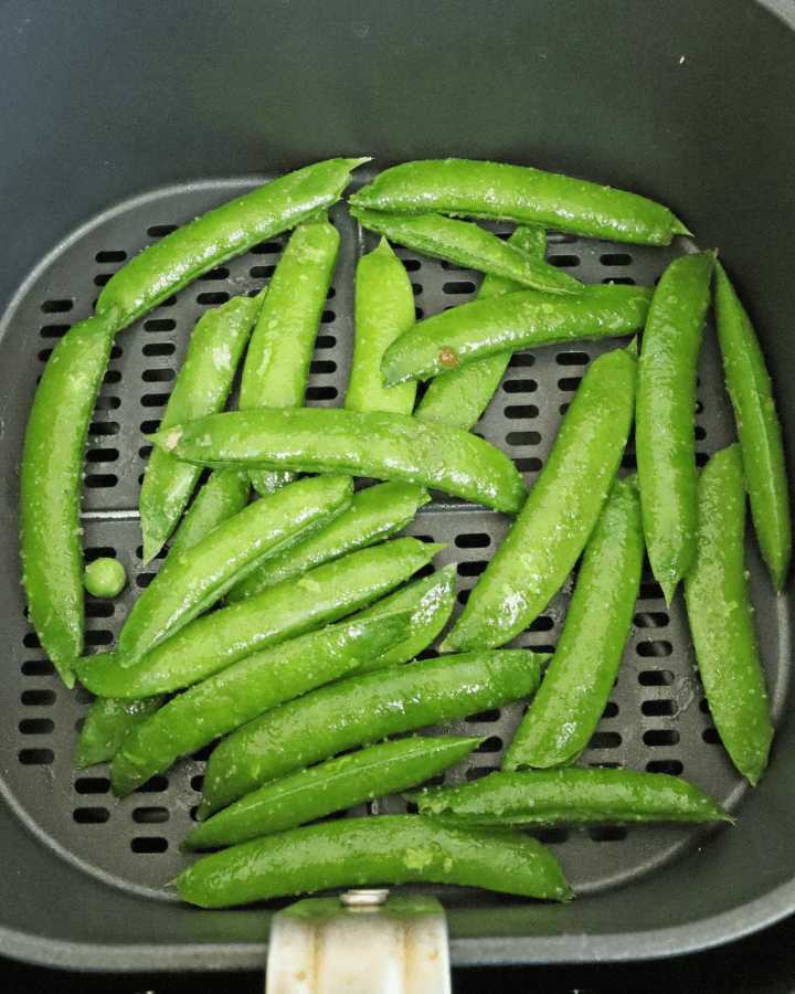 transfer seasoned peas to air fryer