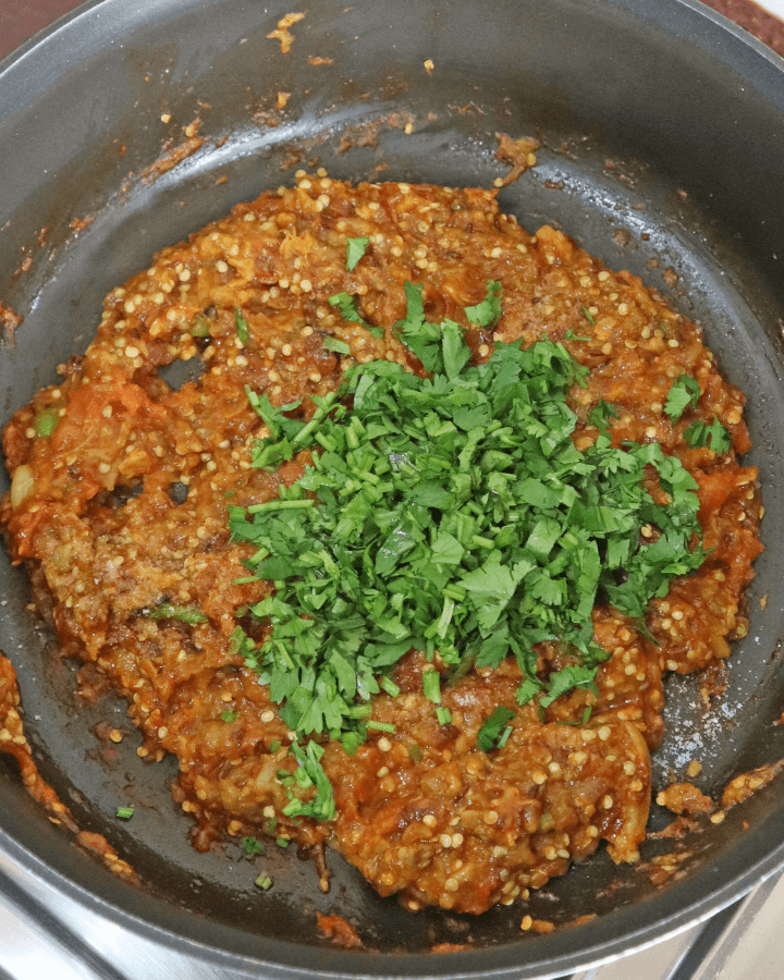 add coriander to pan
