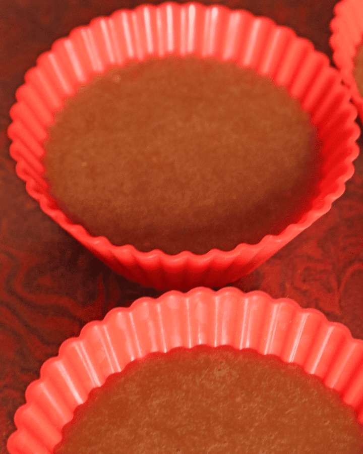 pour cake batter into silicone cup