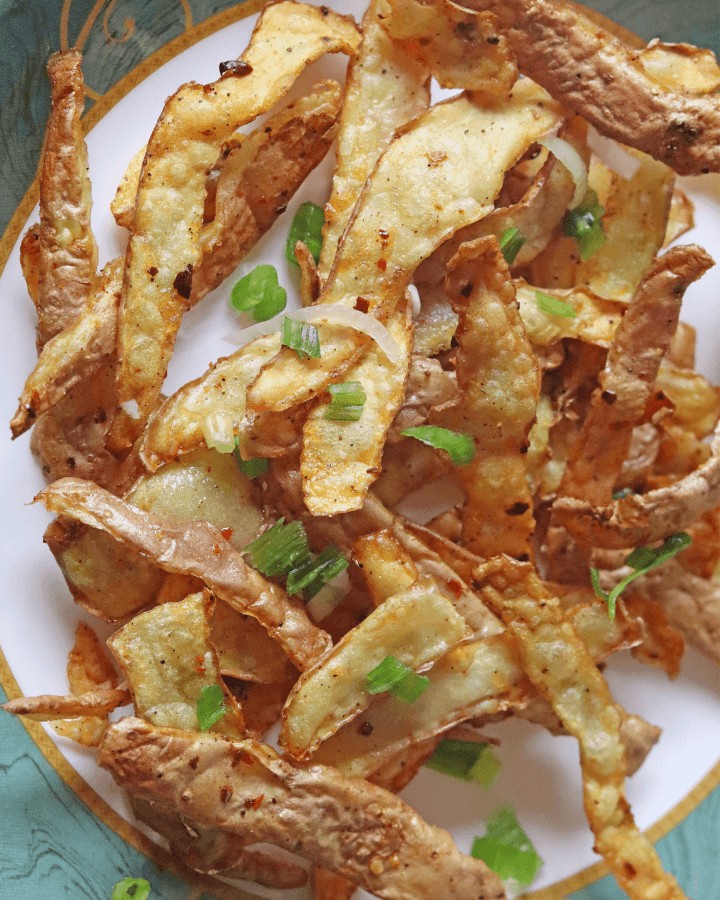 crispy potato peels in plate