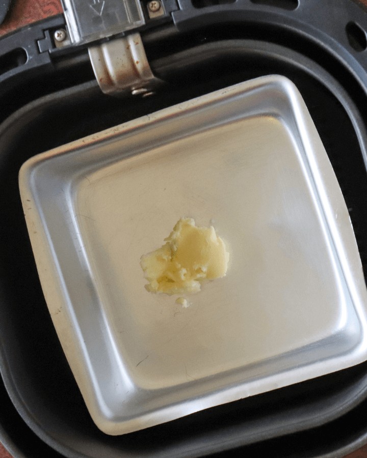 butter in baking pan