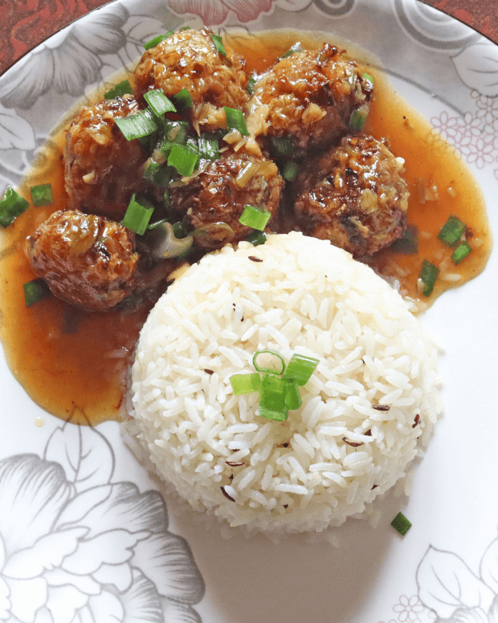 serve veg manchurian balls with rice